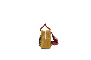 Backpack small golden inventor green